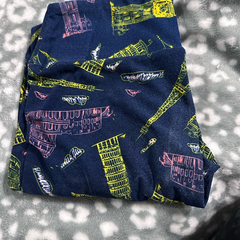 LuLaRoe Navy Leggings with Yellow and Pink Architectural Print